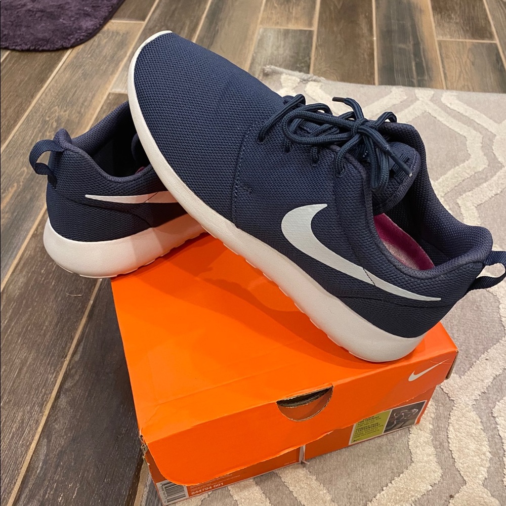 Navy and white Nike tennis shoes-worn once